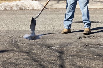 Pothole Filling in Haslet, Texas by Texas Tar and Chip
