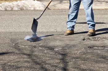 Pothole Filling in Rhome, Texas by Texas Tar and Chip